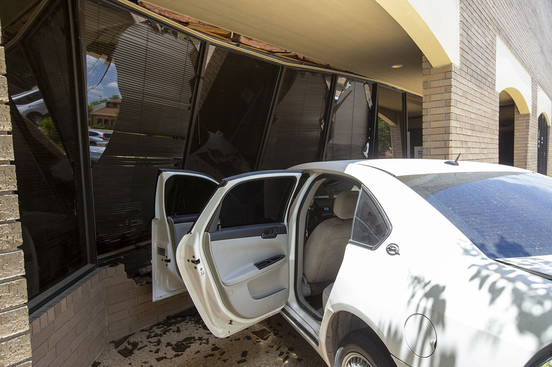 Car crashes into Bryan church, injuring driver
